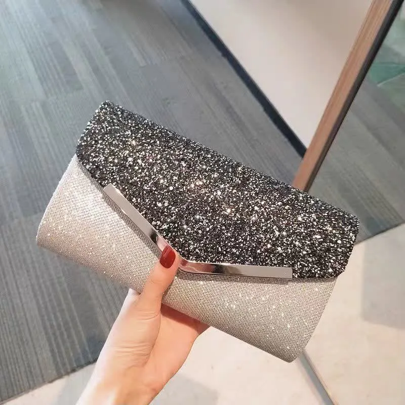 خرید کیف مجلسی زنانه دو رنگ مشکی نقره ای خرید کیف مجلسی زنانه دو رنگ مشکی نقره ای