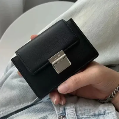 کیف پول زنانه چرم طبیعی مشکی فانتزی